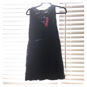 Black lace detail zips in back